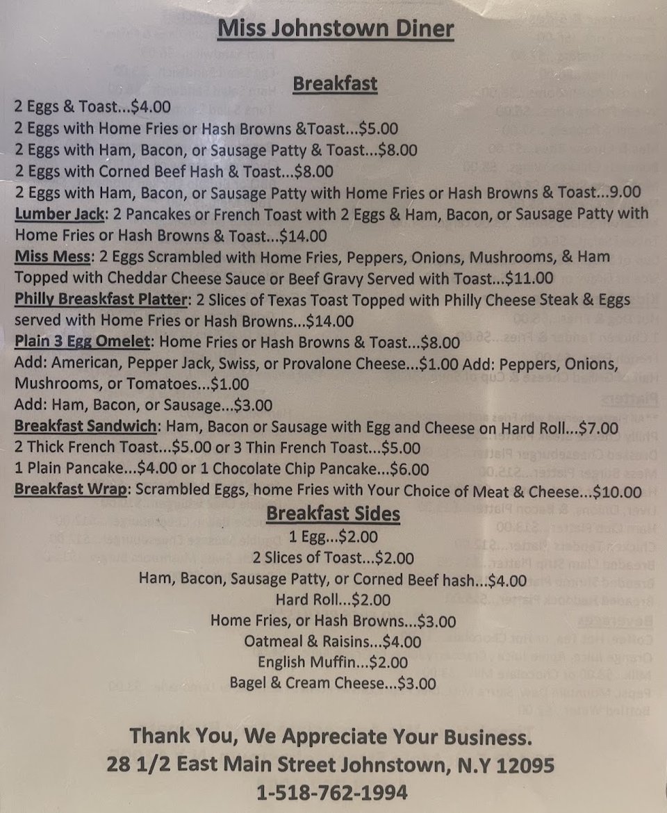 Printed diner menu with hearty breakfast plates